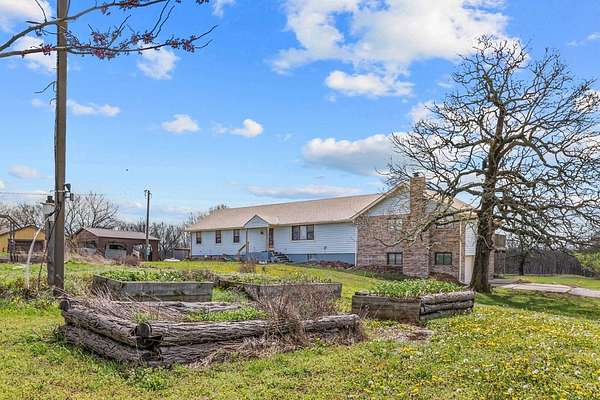 39 Acres of Land with Home for Sale in Centerview, Missouri
