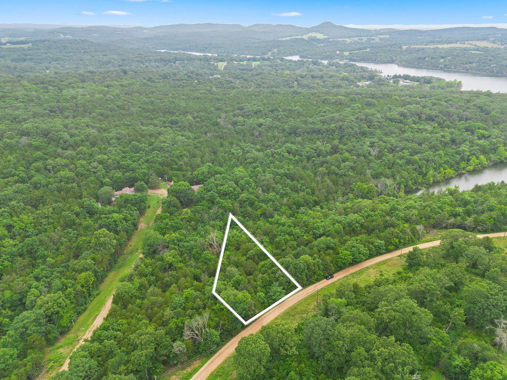 0.54 Acres of Land for Sale in Lampe, Missouri