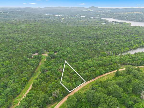 0.54 Acres of Land for Sale in Lampe, Missouri