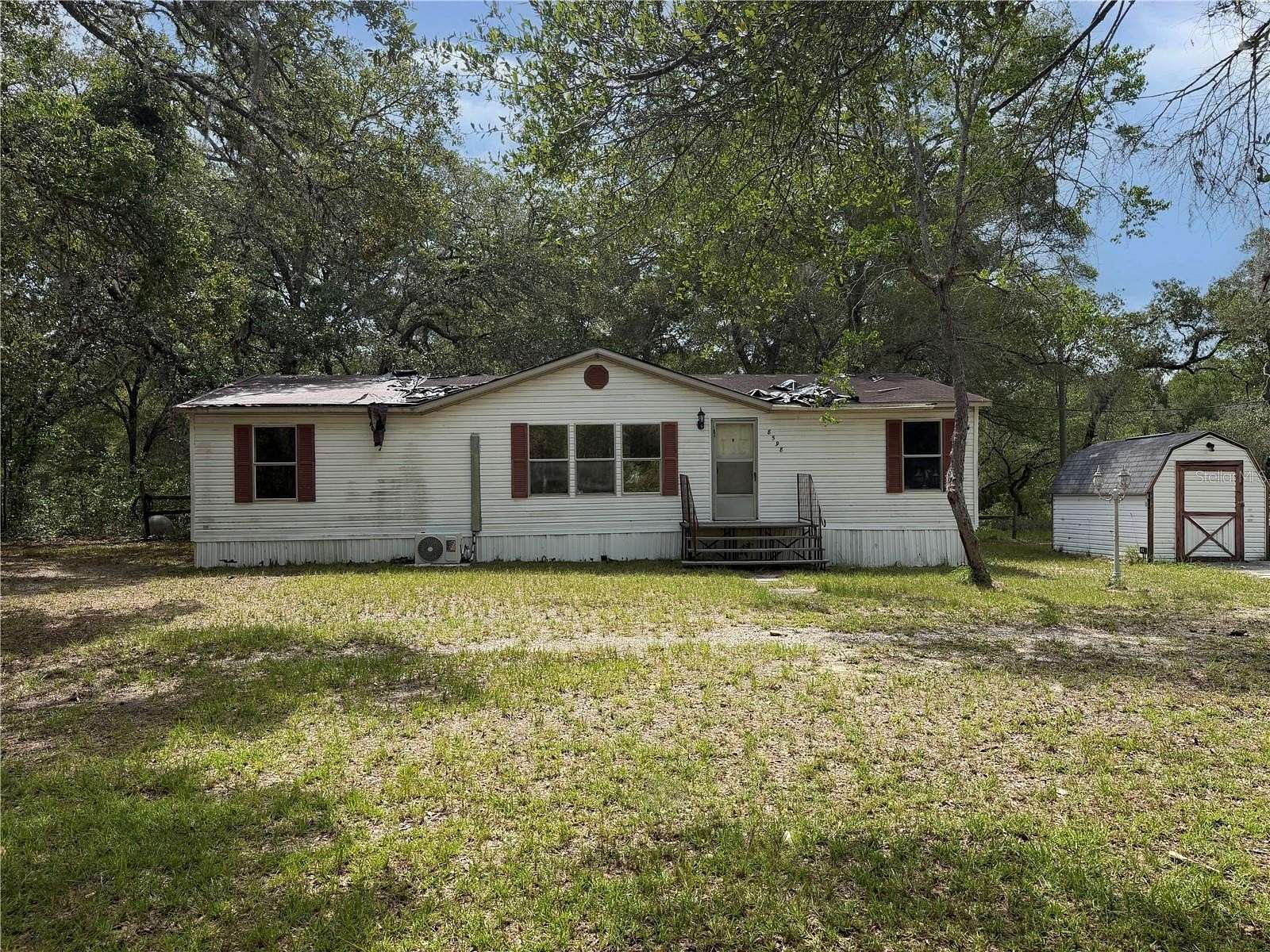2.5 Acres of Land with Home for Sale in Dunnellon, Florida
