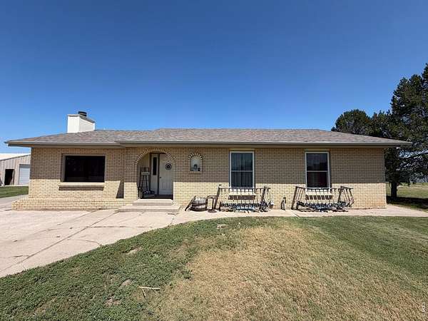 30 Acres of Agricultural Land with Home for Sale in Burlington, Colorado