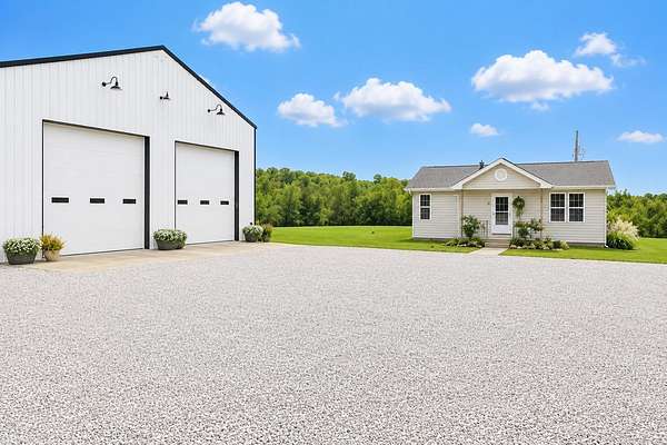 39.8 Acres of Land with Home for Sale in Greenfield, Missouri