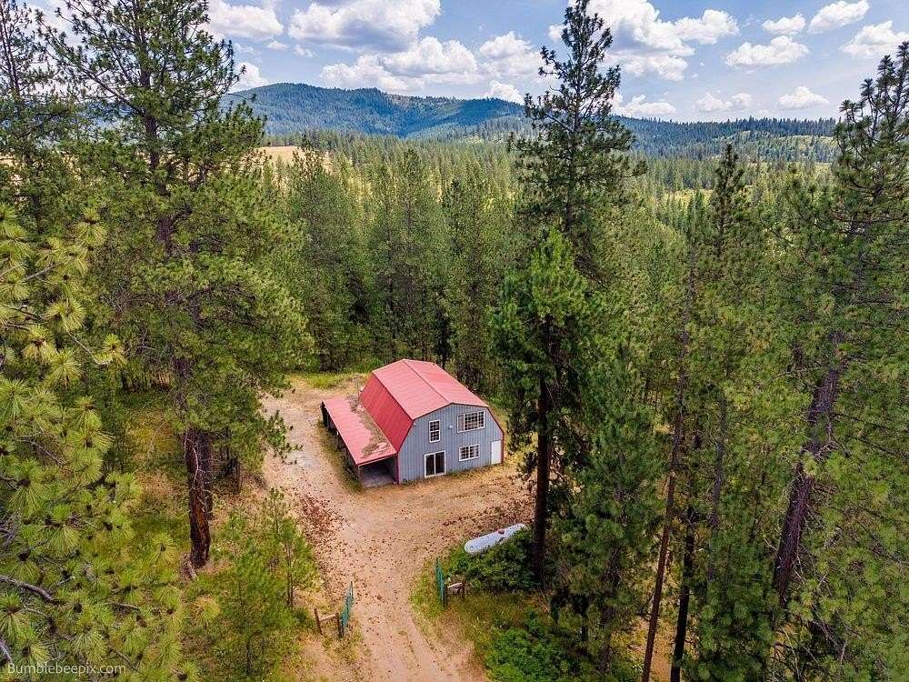 31.8 Acres of Land with Home for Sale in Chattaroy, Washington