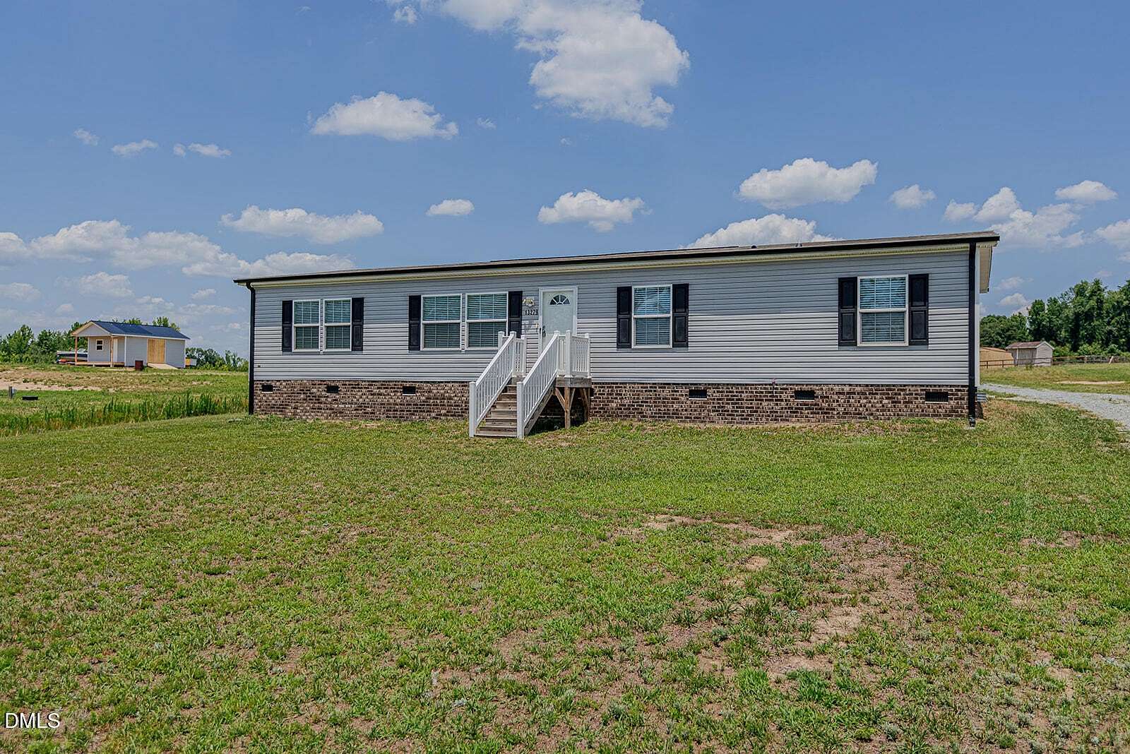 1.67 Acres of Land with Home for Sale in Burlington, North Carolina