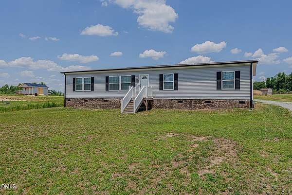 1.67 Acres of Land with Home for Sale in Burlington, North Carolina