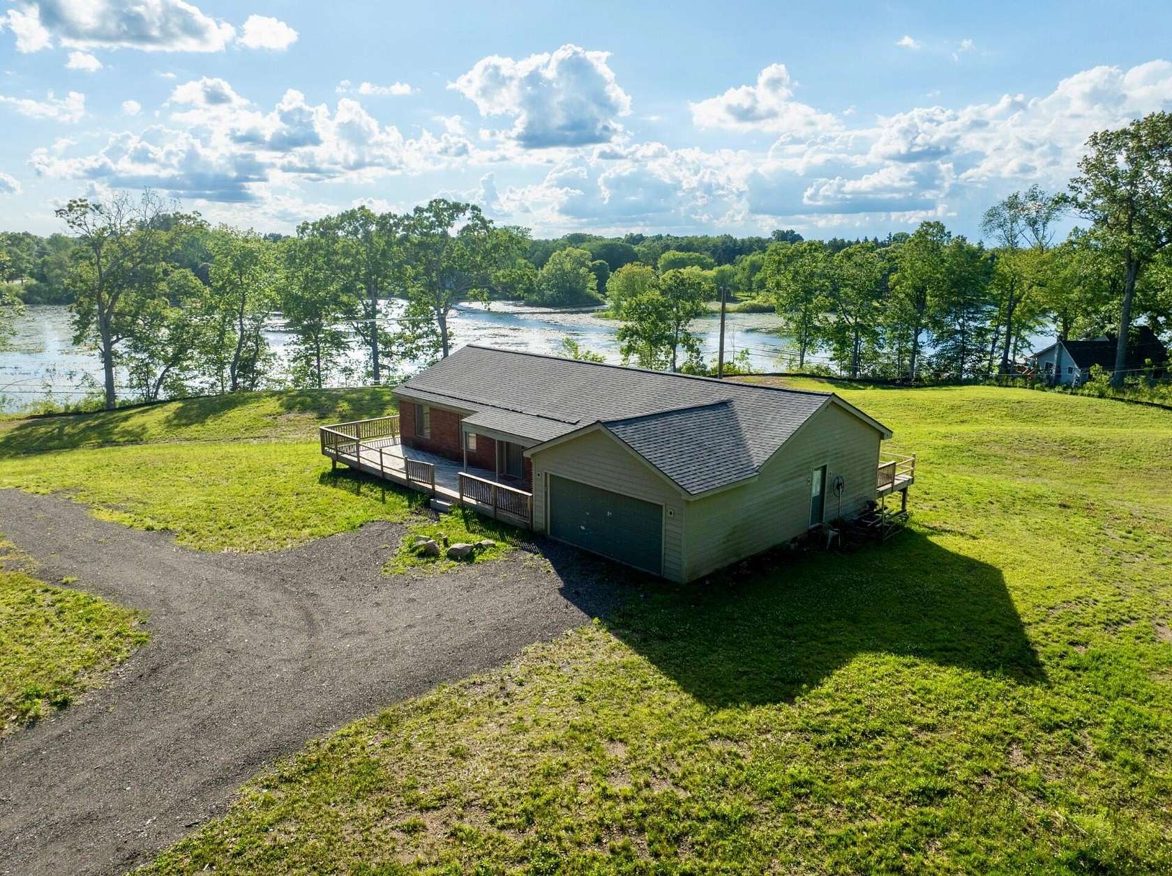 3 Acres of Land with Home for Sale in White Lake, Michigan