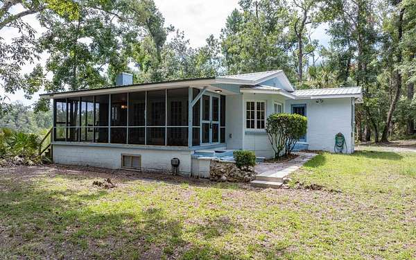 1.53 Acres of Land with Home for Sale in Lee, Florida