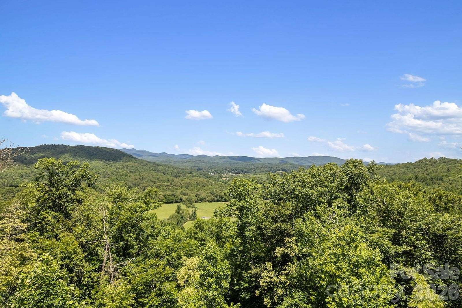 2.84 Acres of Land with Home for Sale in Penrose, North Carolina