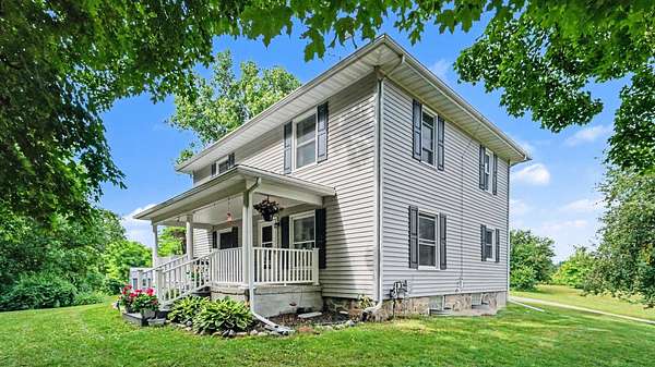 10 Acres of Land with Home for Sale in Chelsea, Michigan