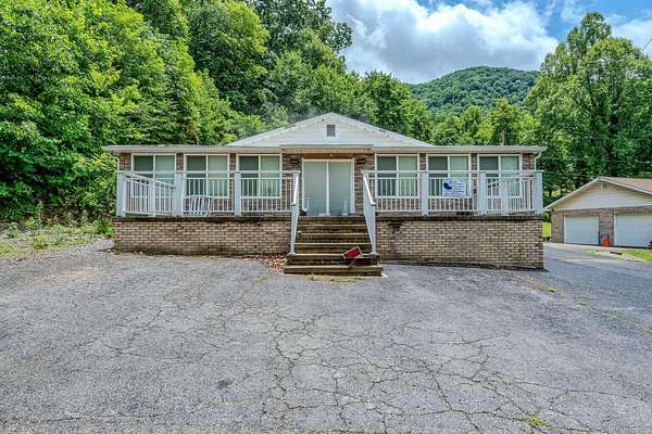 1.5 Acres of Land with Home for Sale in Jenkins, Kentucky