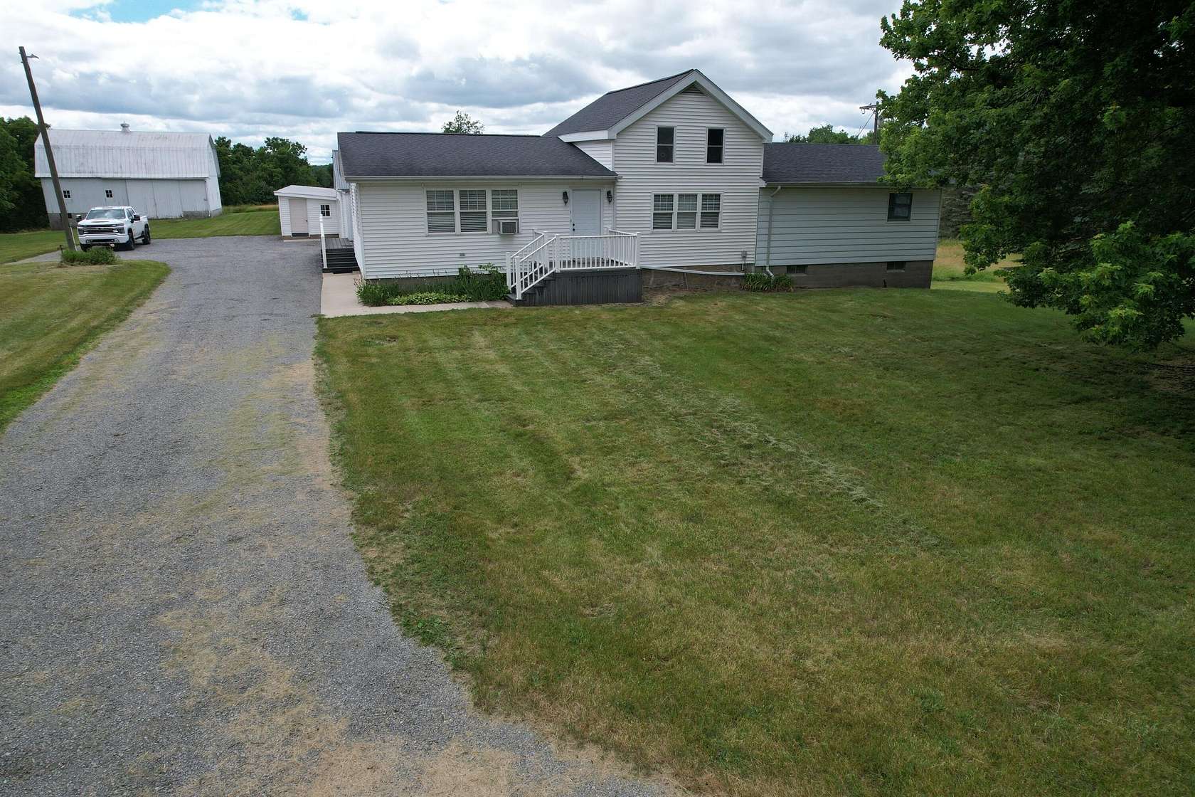2.5 Acres of Land with Home for Sale in Osseo, Michigan