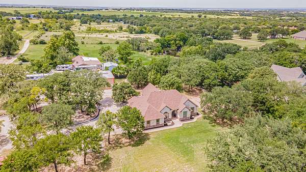 2.53 Acres of Land with Home for Sale in Tolar, Texas