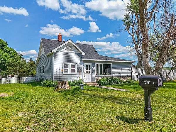 2 Acres of Land with Home for Sale in Elmira, Michigan