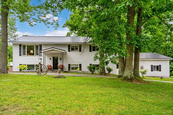 10.5 Acres of Land with Home for Sale in Hubbard Lake, Michigan