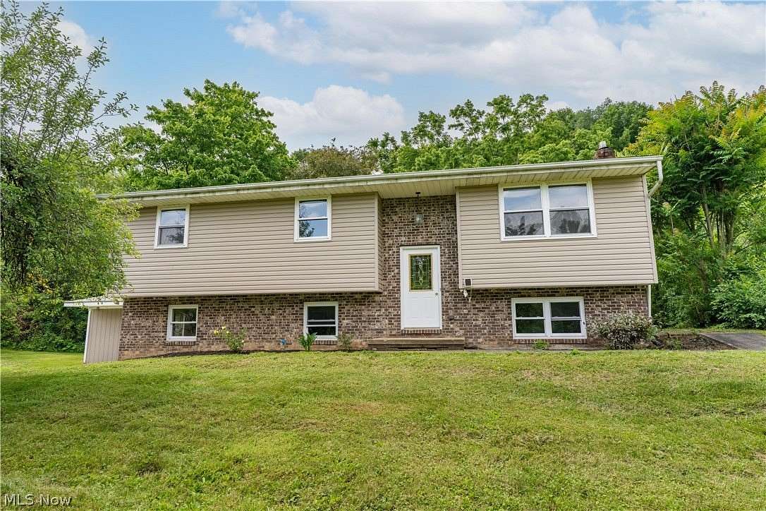 3.48 Acres of Land with Home for Sale in Minerva, Ohio