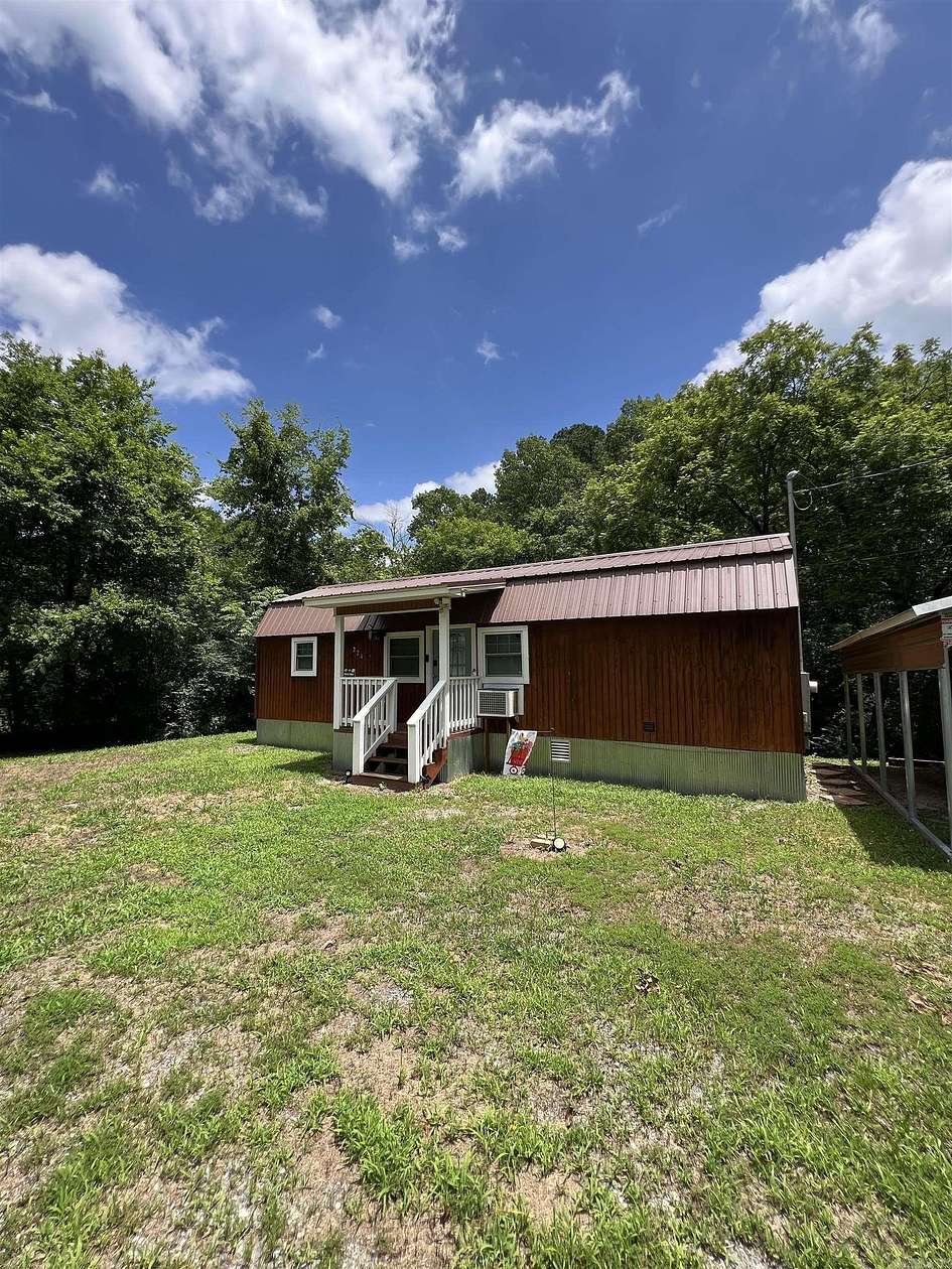 0.71 Acres of Land with Home for Sale in Mount Ida, Arkansas