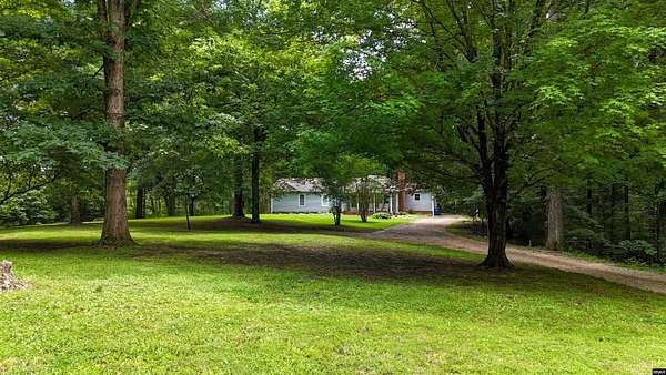 16.7 Acres of Land with Home for Sale in Dresden, Tennessee