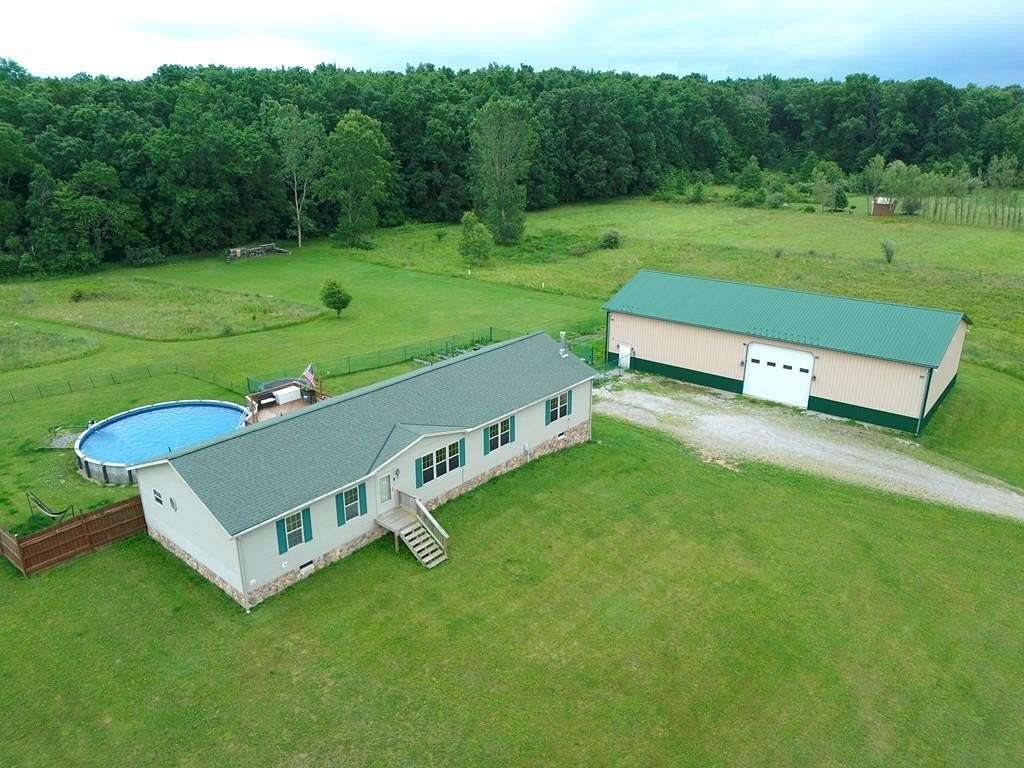 13 Acres of Recreational Land with Home for Sale in Sullivan, Ohio