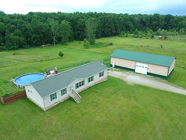 13 Acres of Recreational Land with Home for Sale in Sullivan, Ohio