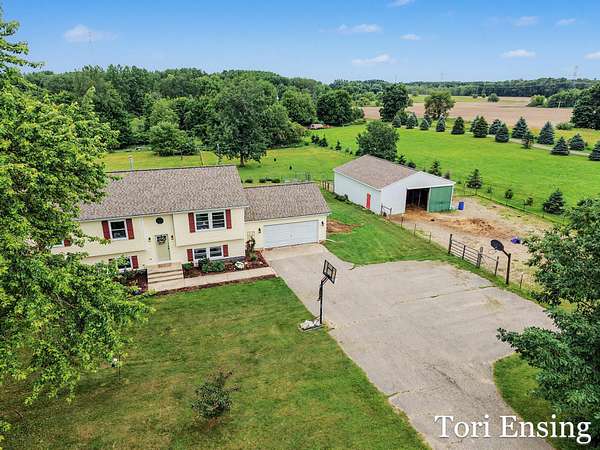 3 Acres of Land with Home for Sale in Rockford, Michigan