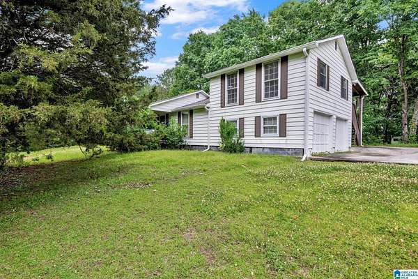 2 Acres of Land with Home for Sale in Trafford, Alabama