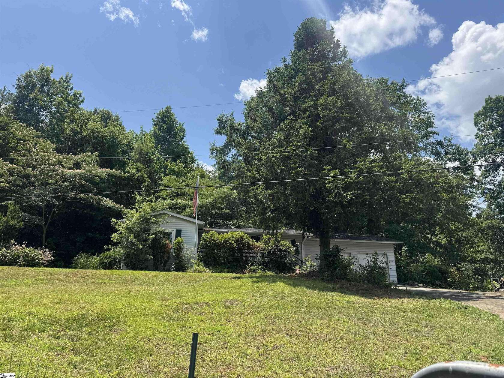 10.7 Acres of Land with Home for Sale in Travelers Rest, South Carolina