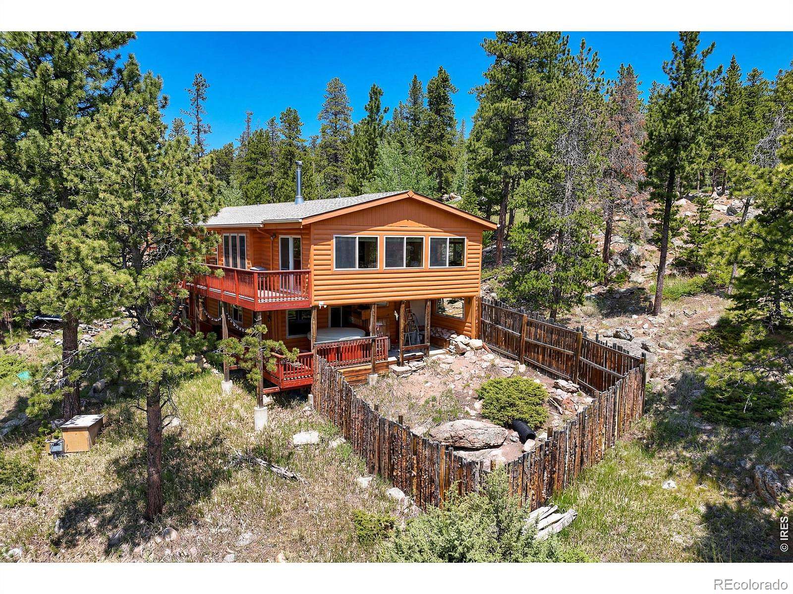 1.77 Acres of Land with Home for Sale in Red Feather Lakes, Colorado