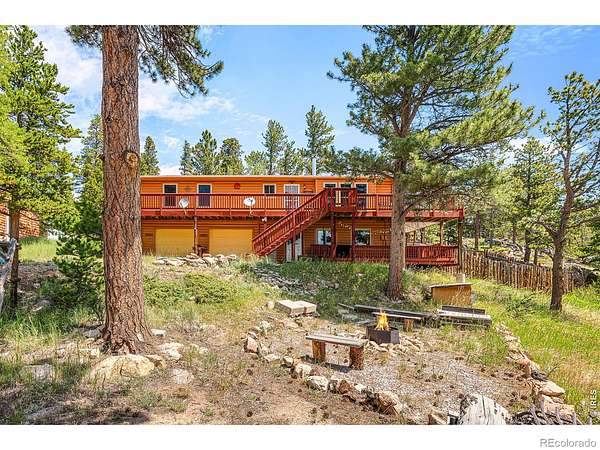 1.77 Acres of Land with Home for Sale in Red Feather Lakes, Colorado