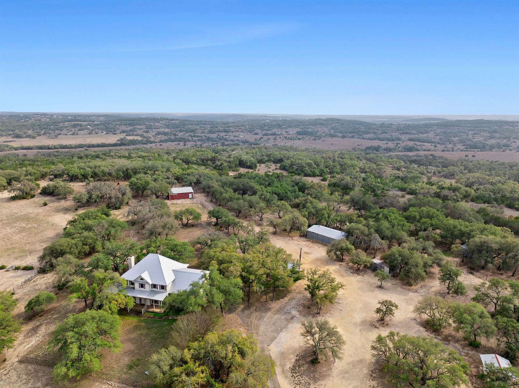60.2 Acres of Land with Home for Sale in Blanco, Texas