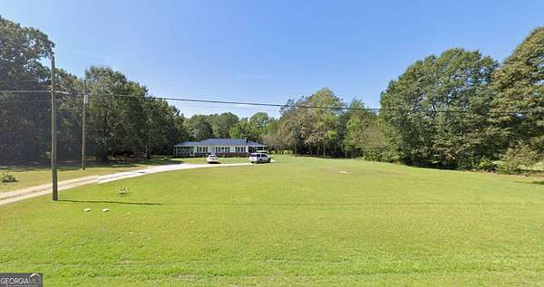 5.53 Acres of Land with Home for Sale in Dewy Rose, Georgia