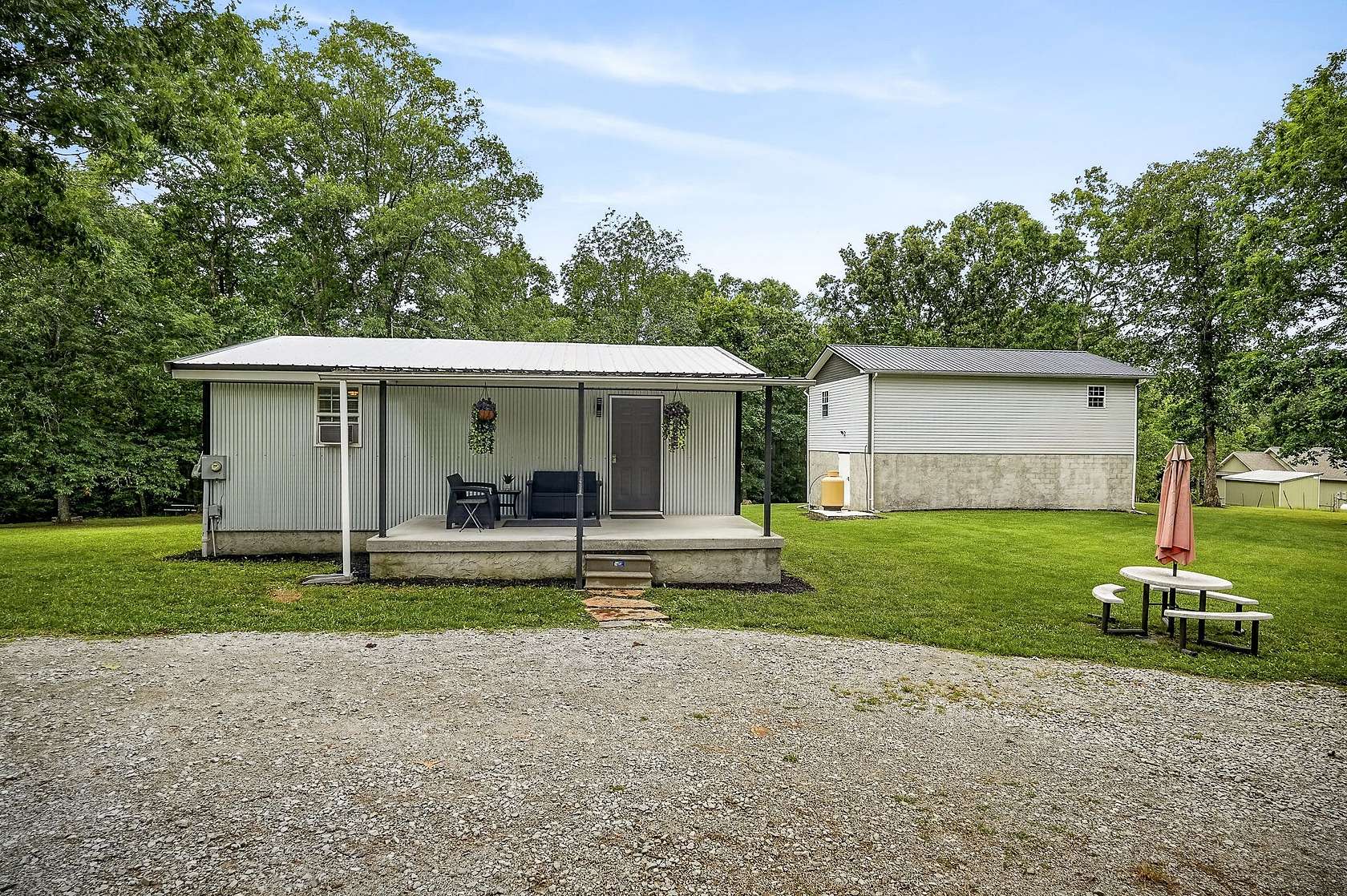 4.9 Acres of Land with Home for Sale in Crab Orchard, Tennessee
