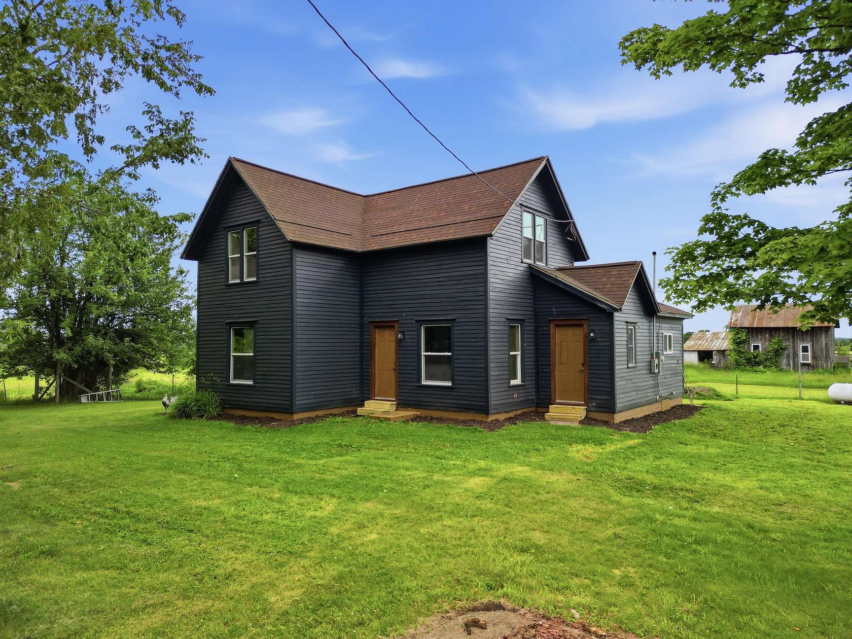 10 Acres of Land with Home for Sale in Big Rapids, Michigan