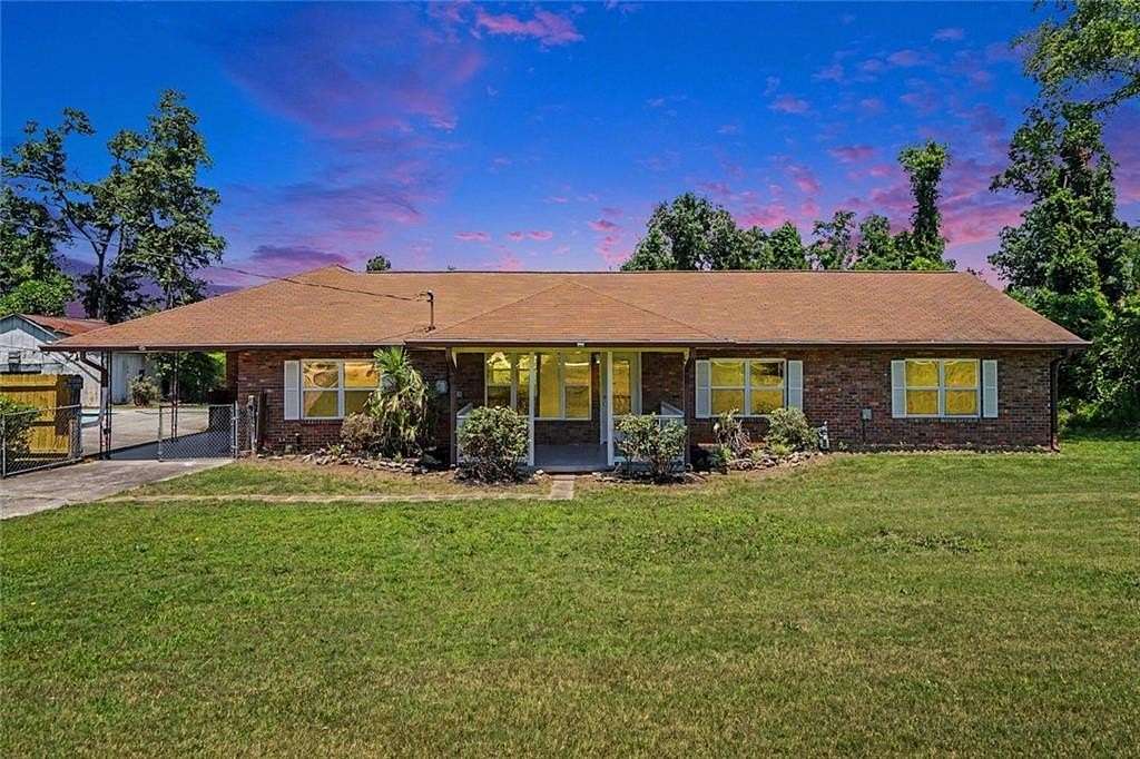 2.77 Acres of Land with Home for Sale in Conyers, Georgia