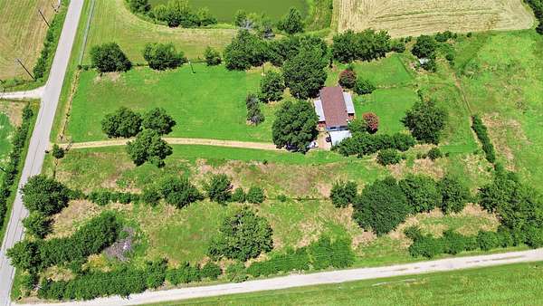 9.56 Acres of Land with Home for Sale in Terrell, Texas
