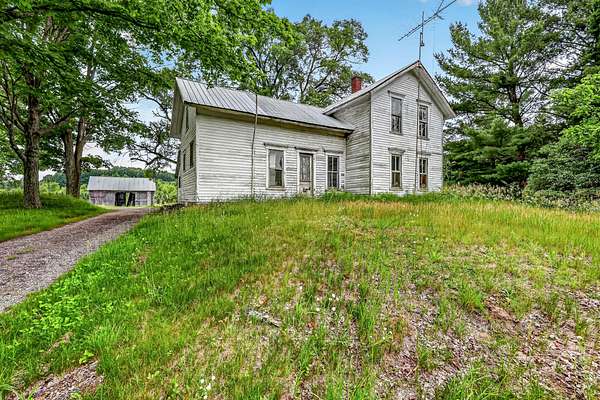 40 Acres of Land with Home for Sale in Shelby, Michigan