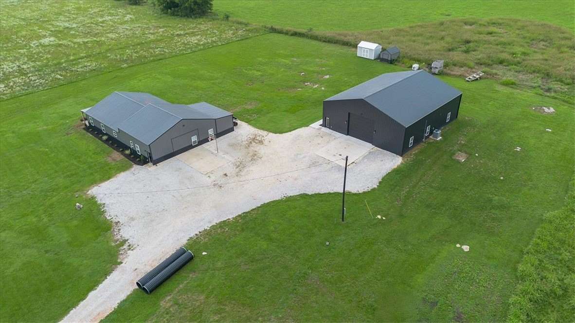 15.7 Acres of Land with Home for Sale in Prairie Grove, Arkansas