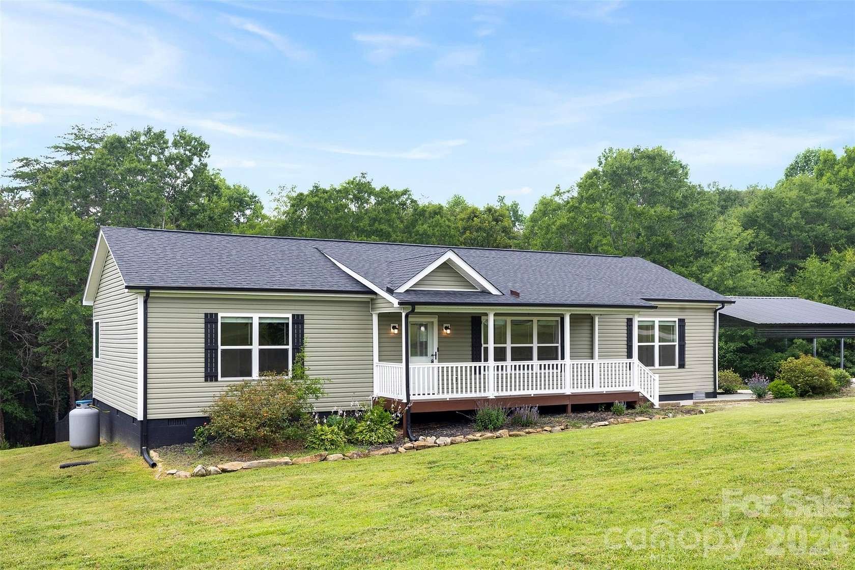 3.26 Acres of Land with Home for Sale in Dallas, North Carolina