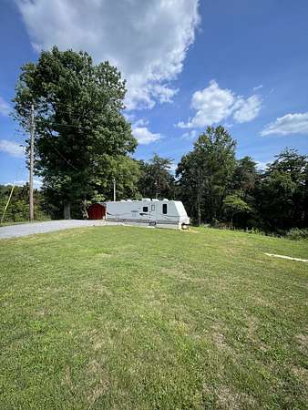 6.2 Acres of Land with Home for Sale in Moss, Tennessee
