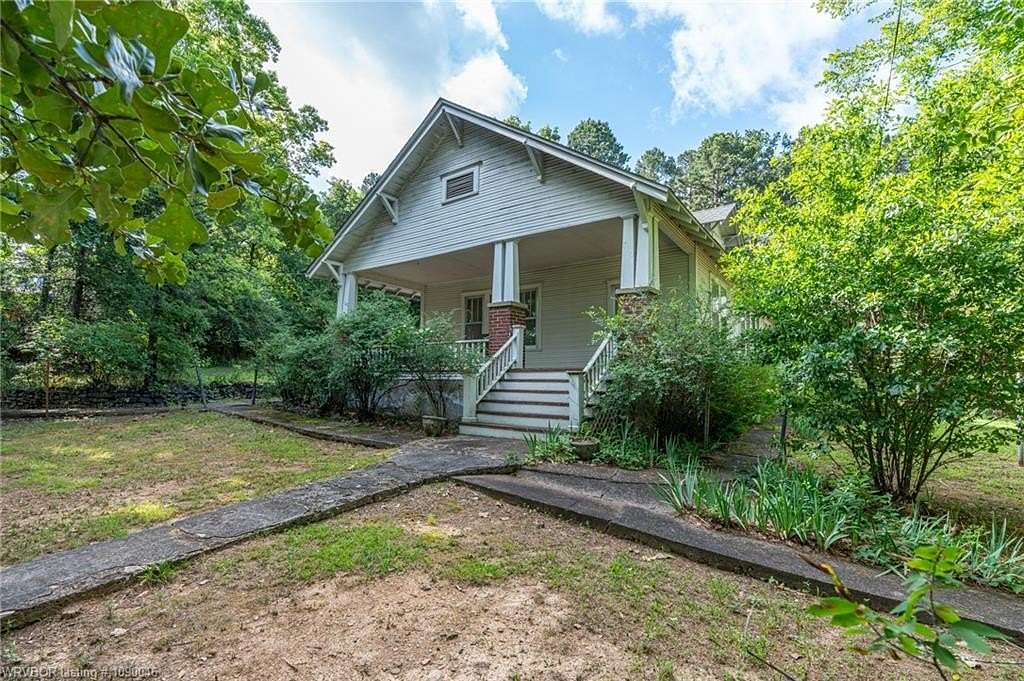 4.75 Acres of Land with Home for Sale in Paris, Arkansas