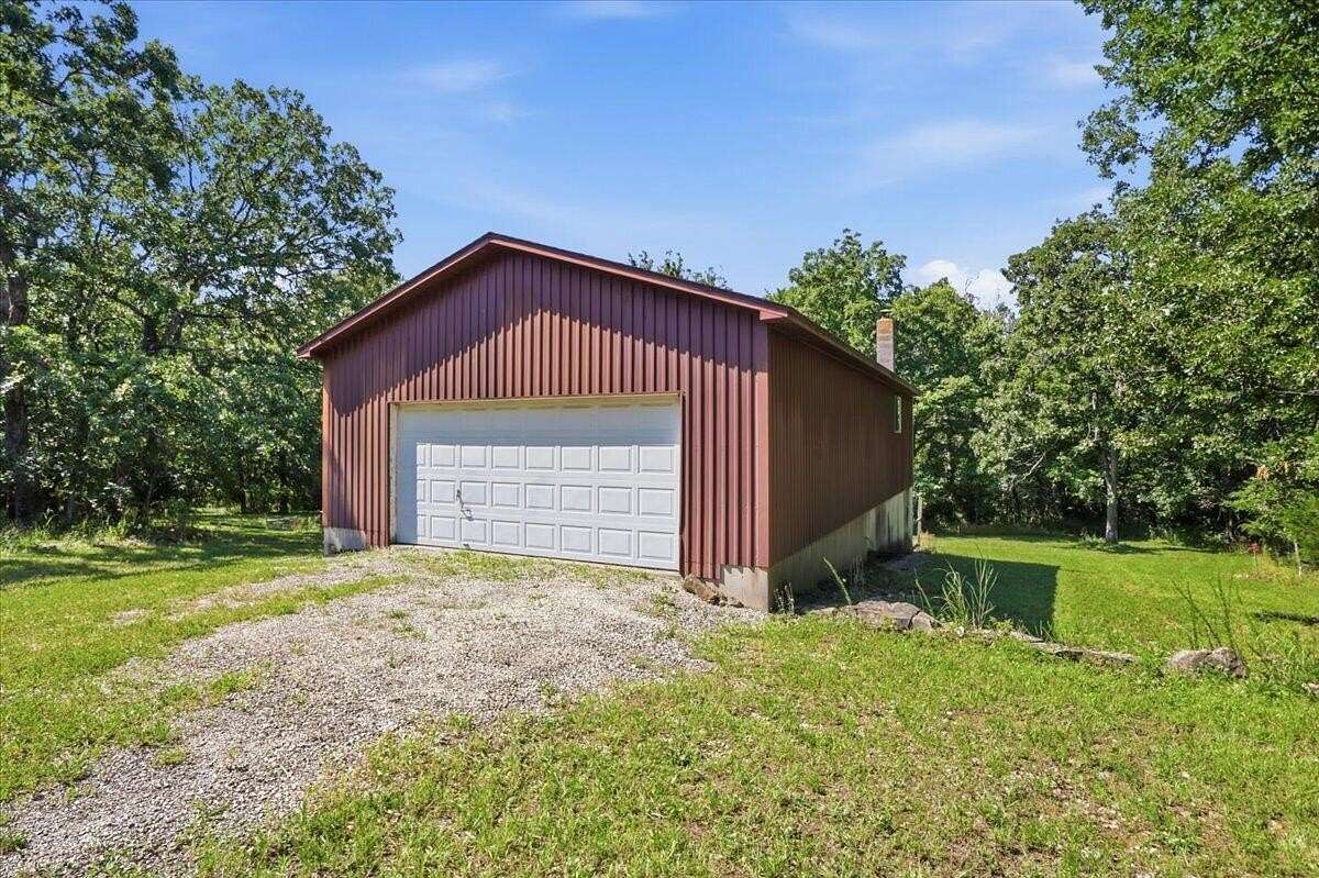 74 Acres of Recreational Land with Home for Sale in Elkland, Missouri