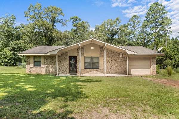 1.55 Acres of Land with Home for Sale in Palestine, Texas