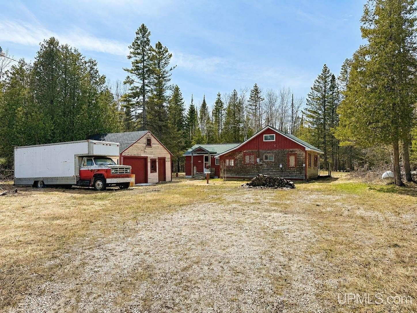 10 Acres of Recreational Land with Home for Sale in Gould City, Michigan