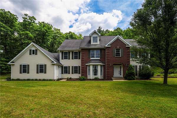 6.43 Acres of Land with Home for Sale in Corning, New York