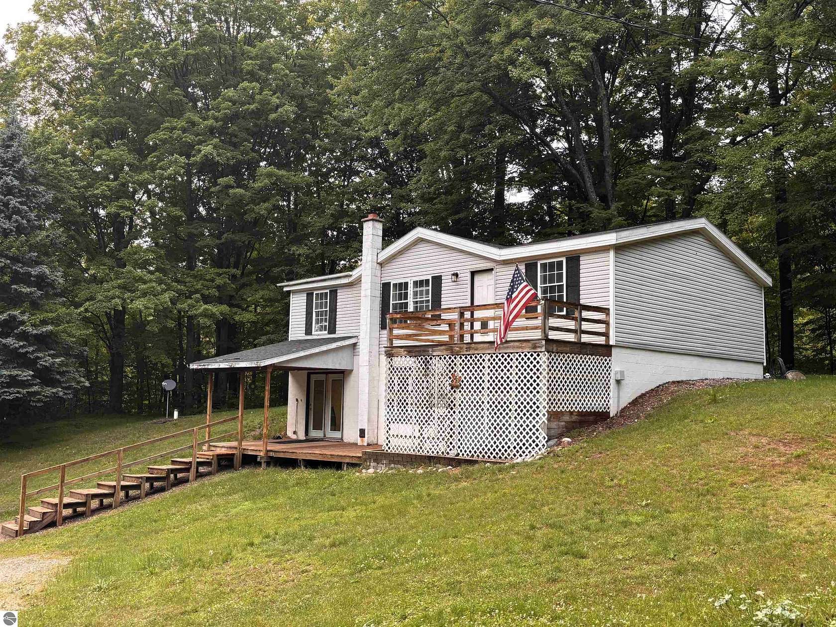 2.47 Acres of Land with Home for Sale in Honor, Michigan