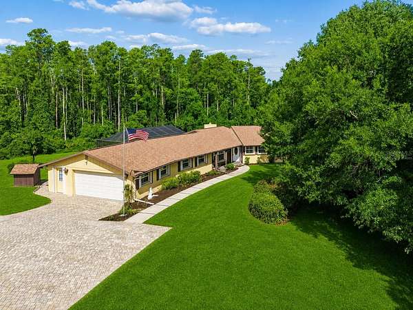 2.39 Acres of Land with Home for Sale in New Port Richey, Florida
