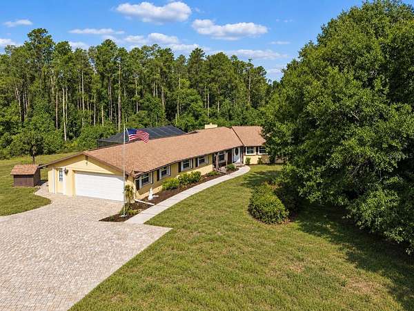 2.39 Acres of Land with Home for Sale in New Port Richey, Florida