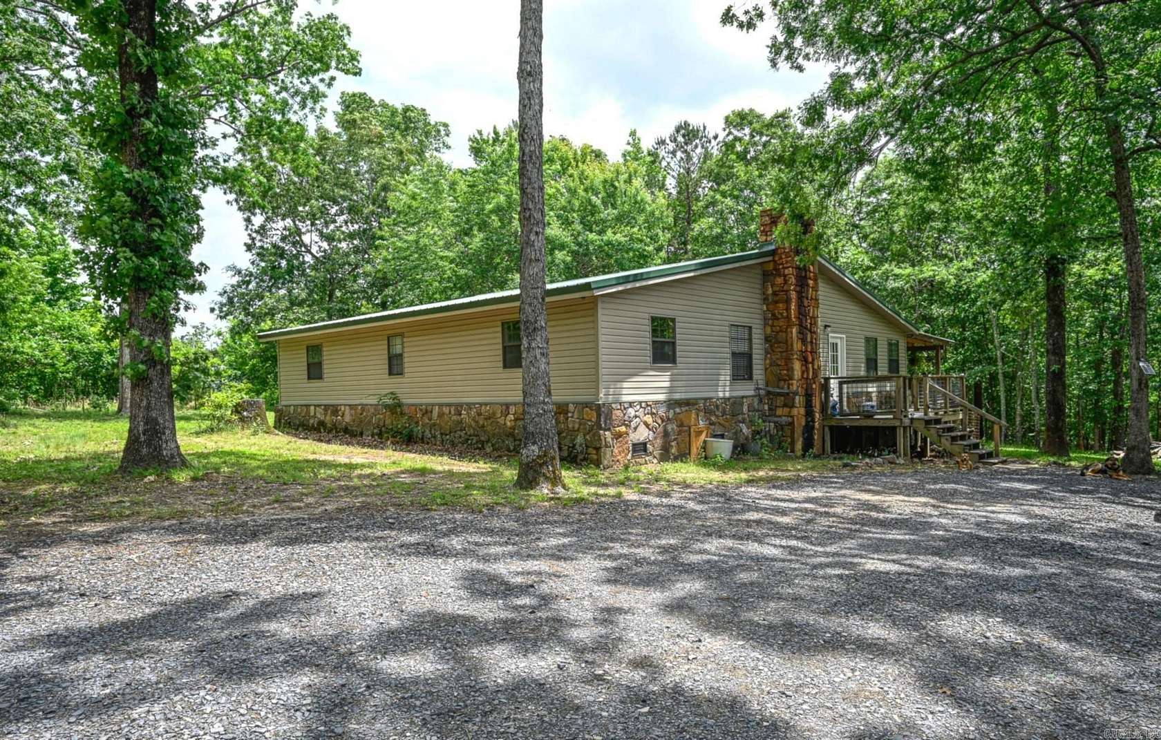 4.74 Acres of Land with Home for Sale in Mena, Arkansas