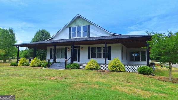 2.7 Acres of Land with Home for Sale in Mansfield, Georgia