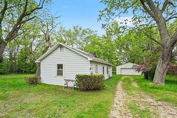 2 Acres of Land with Home for Sale in Spring Lake, Michigan