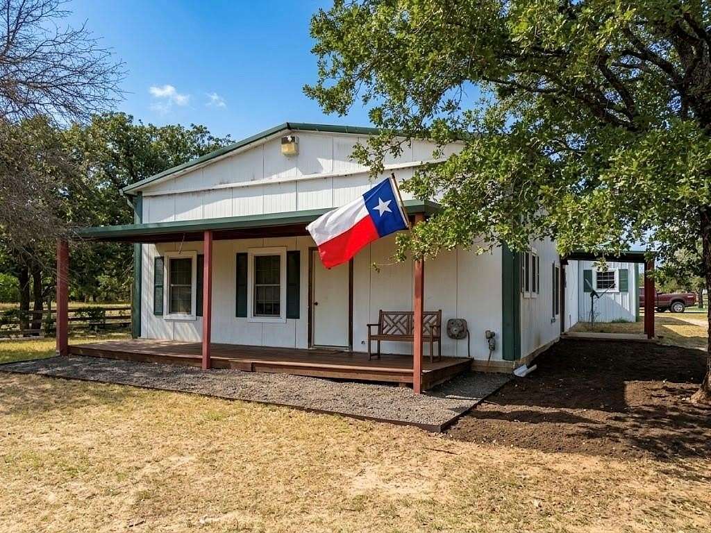 10 Acres of Land with Home for Sale in Scurry, Texas